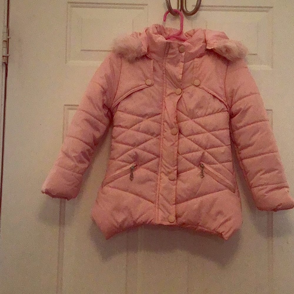 A light pink/peach puffer jacket for 6 year olds